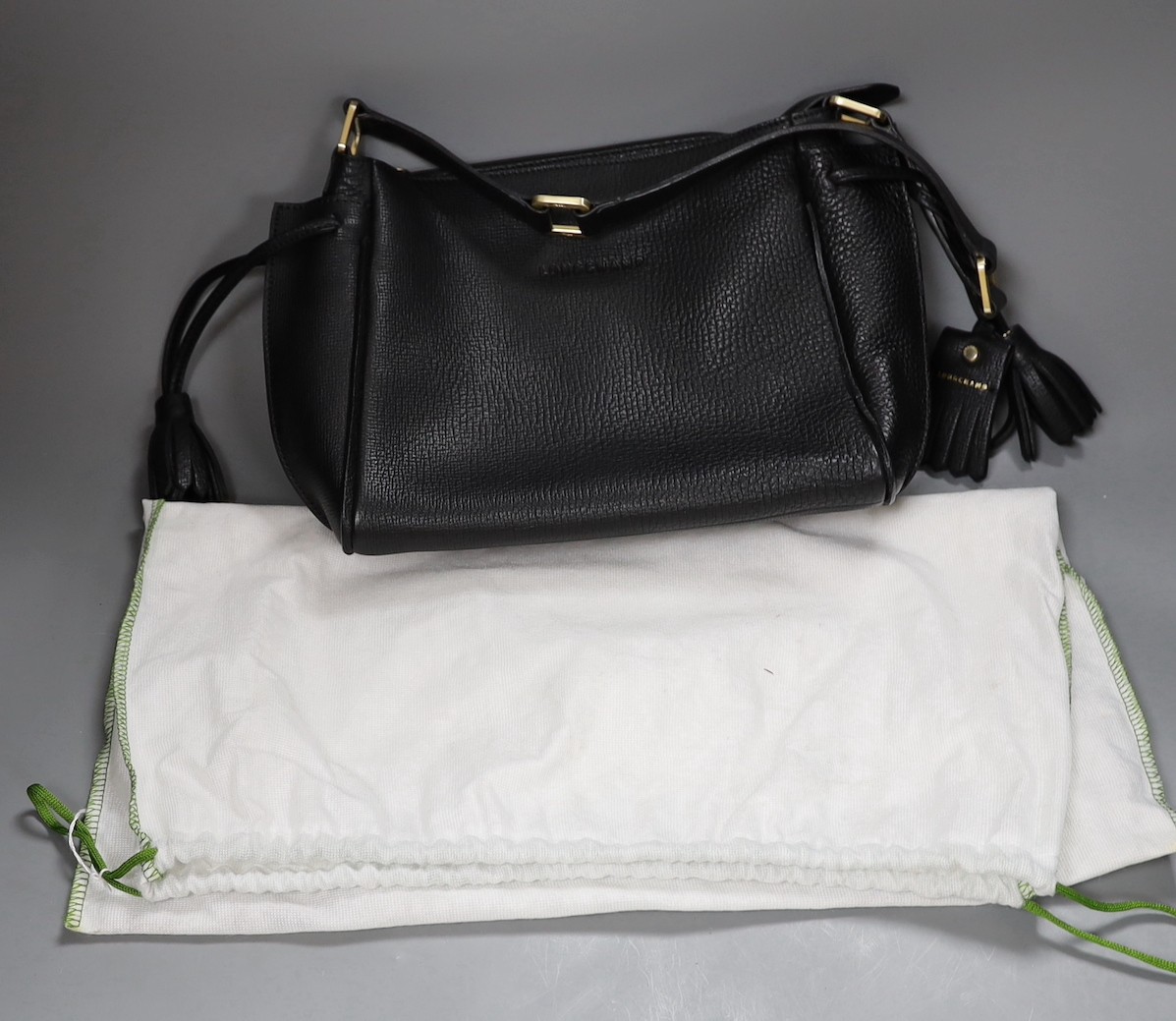 A black leather Longchamp shoulder bag with dust bag, 35 cms wide x 21 cms high